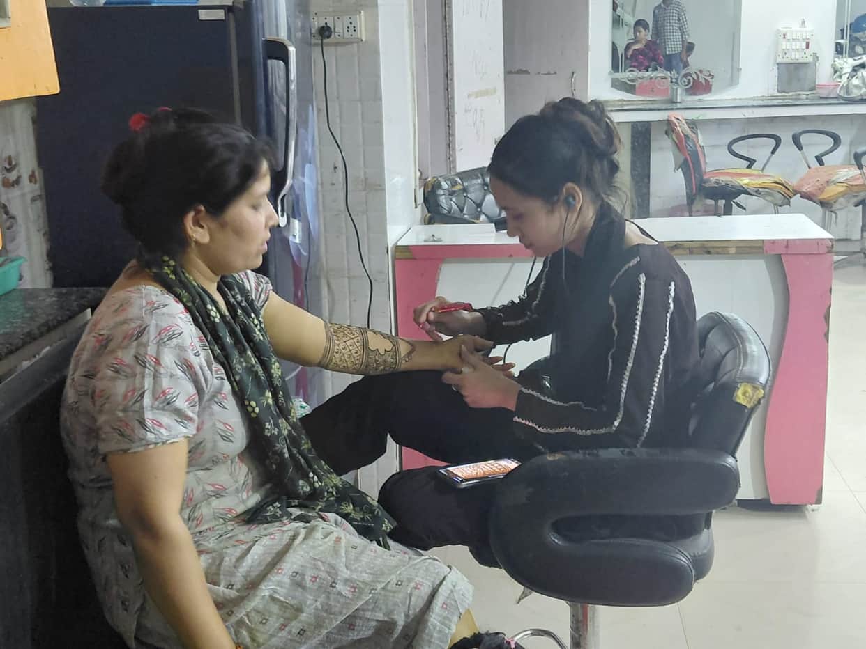 Women have started applying henna; crowds are also seen at saree showrooms.