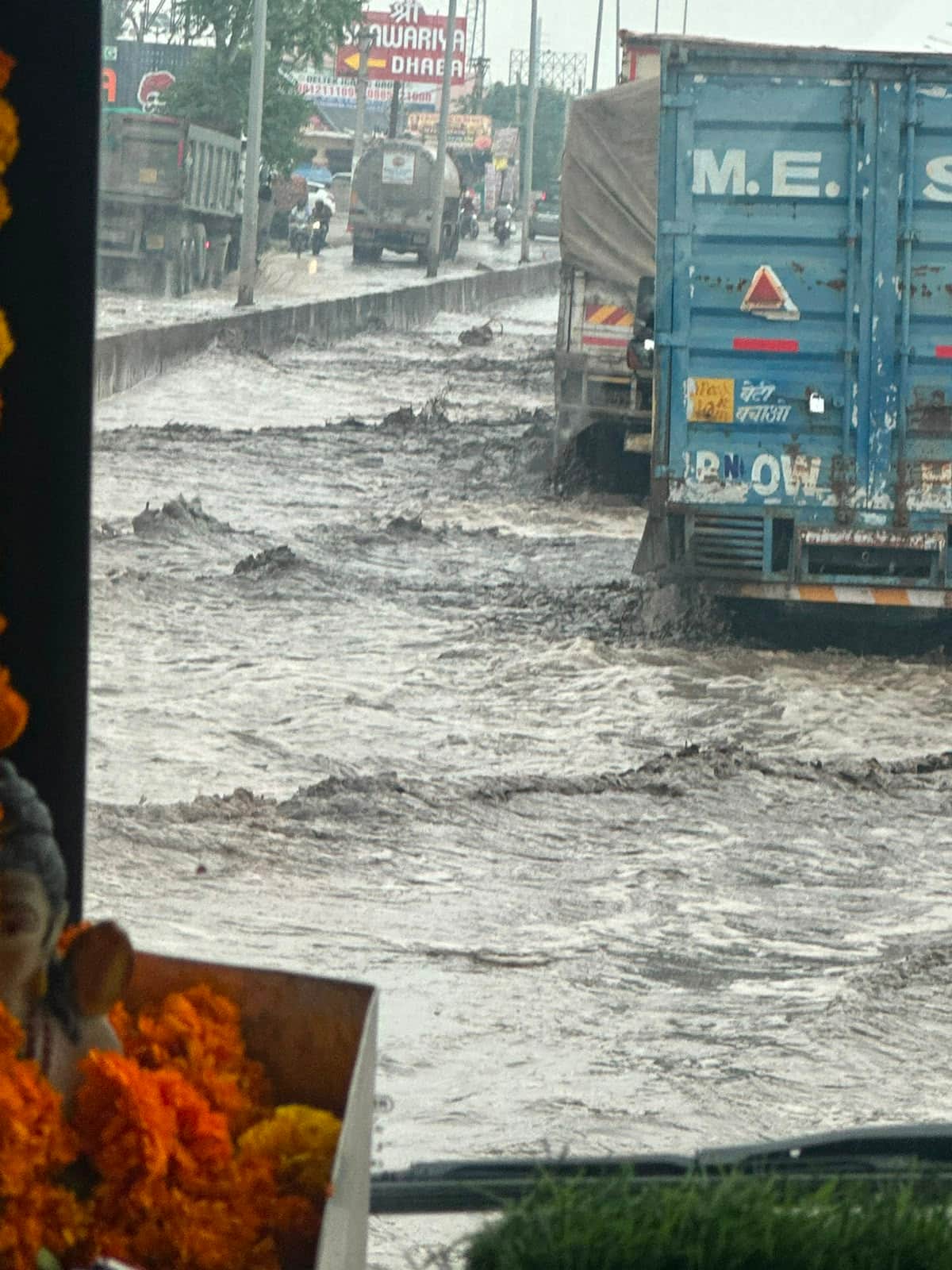 Waterlogging on the road to Dharuhera after the rain.