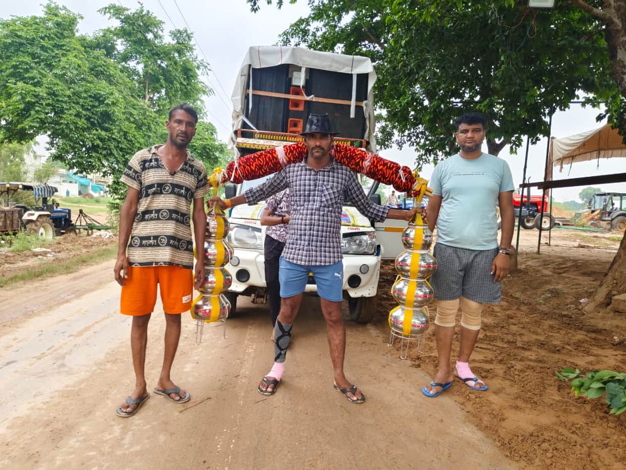 Devotees of Shiva set out carrying *Gangajal* and the *Shiv-Shankar* (Kanwar) on their shoulders.