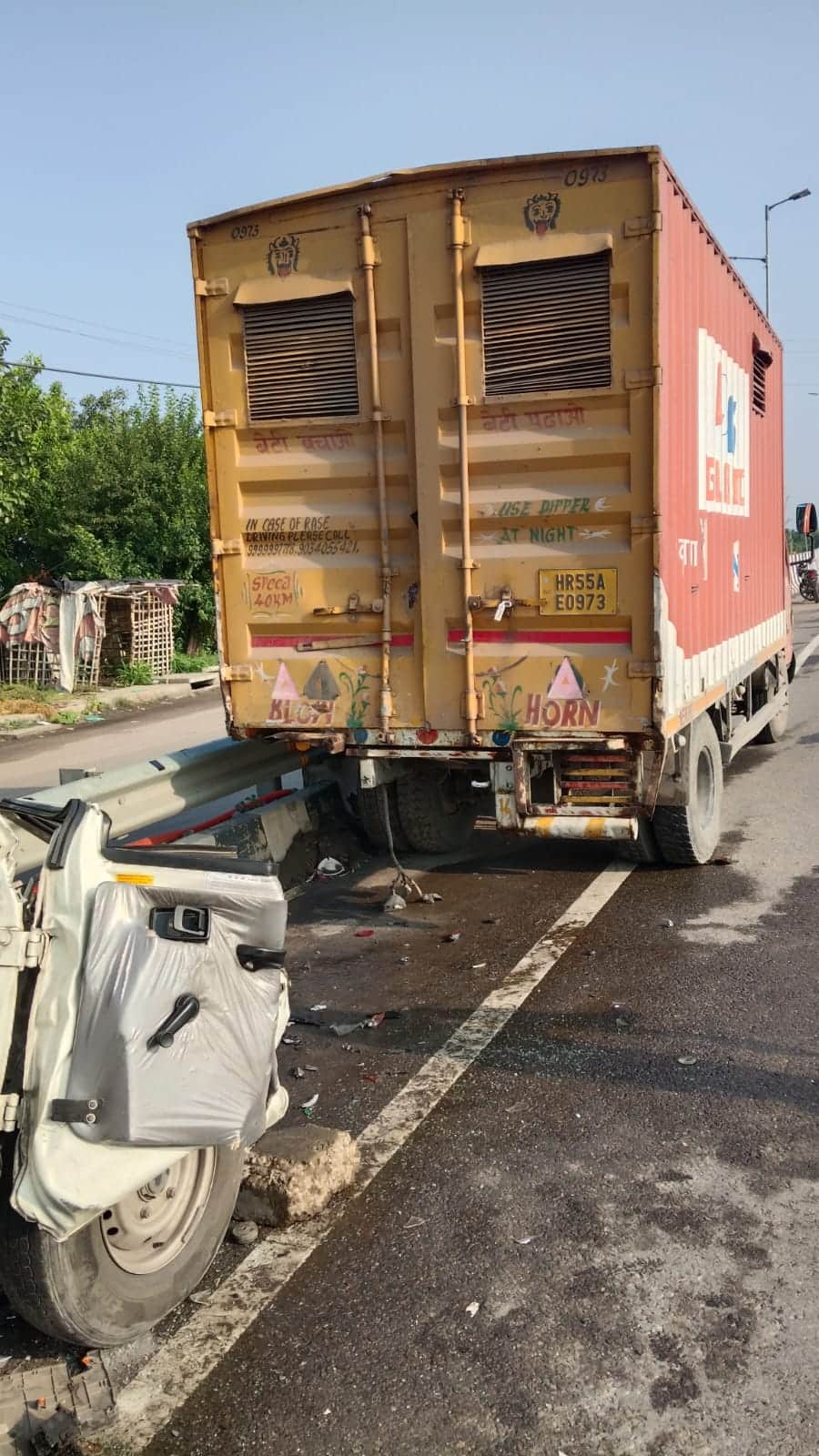 Bolero crashes into stationary Canter; driver dies.
