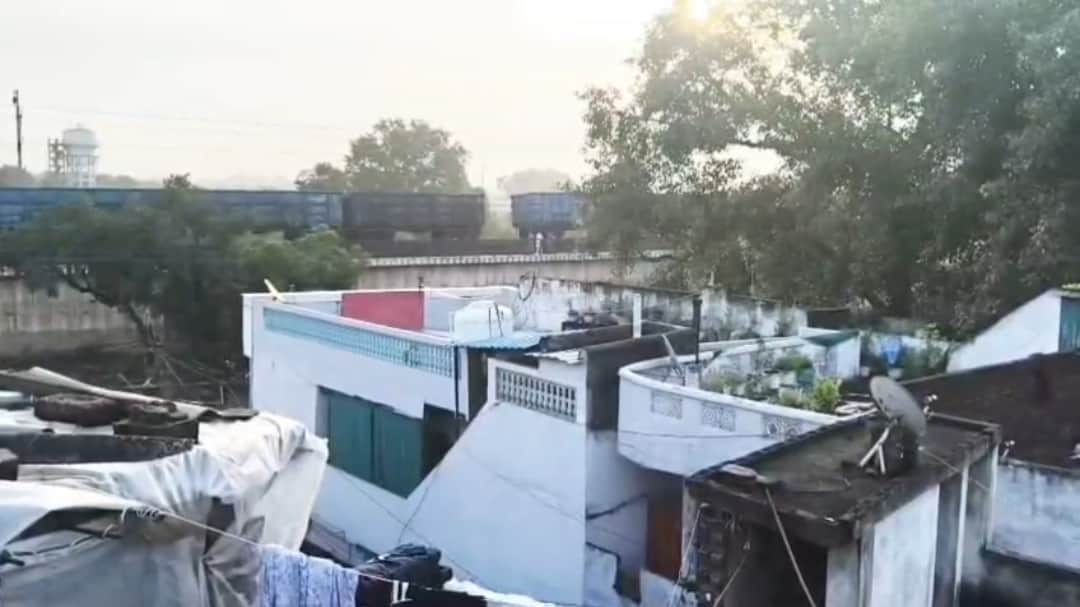 Coal-laden freight train splits in two after coupling snaps on a moving train; major rail accident averted.