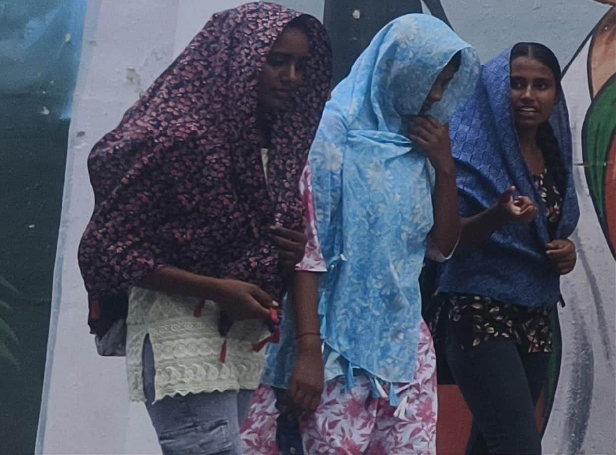Light drizzle increased the humidity; people remained miserable throughout the day.