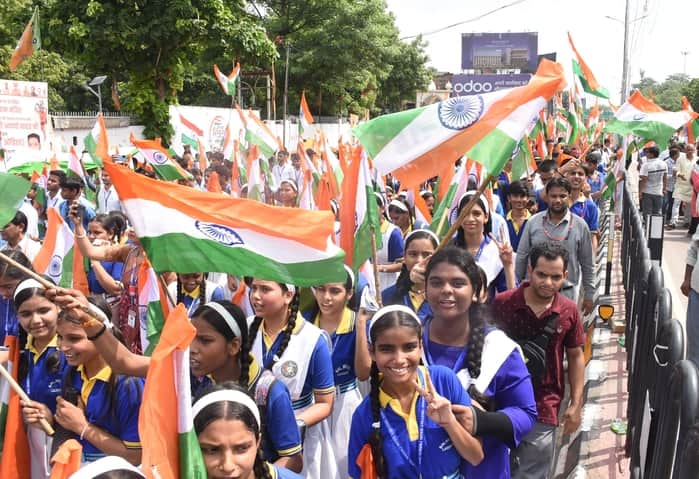 Children marching with the Tricolour awakened a sense of patriotism.