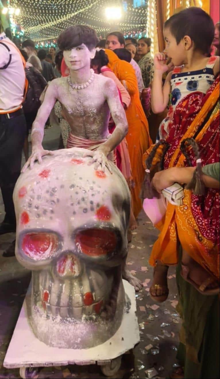 Devotees of Shiva arrived wearing ghost masks.