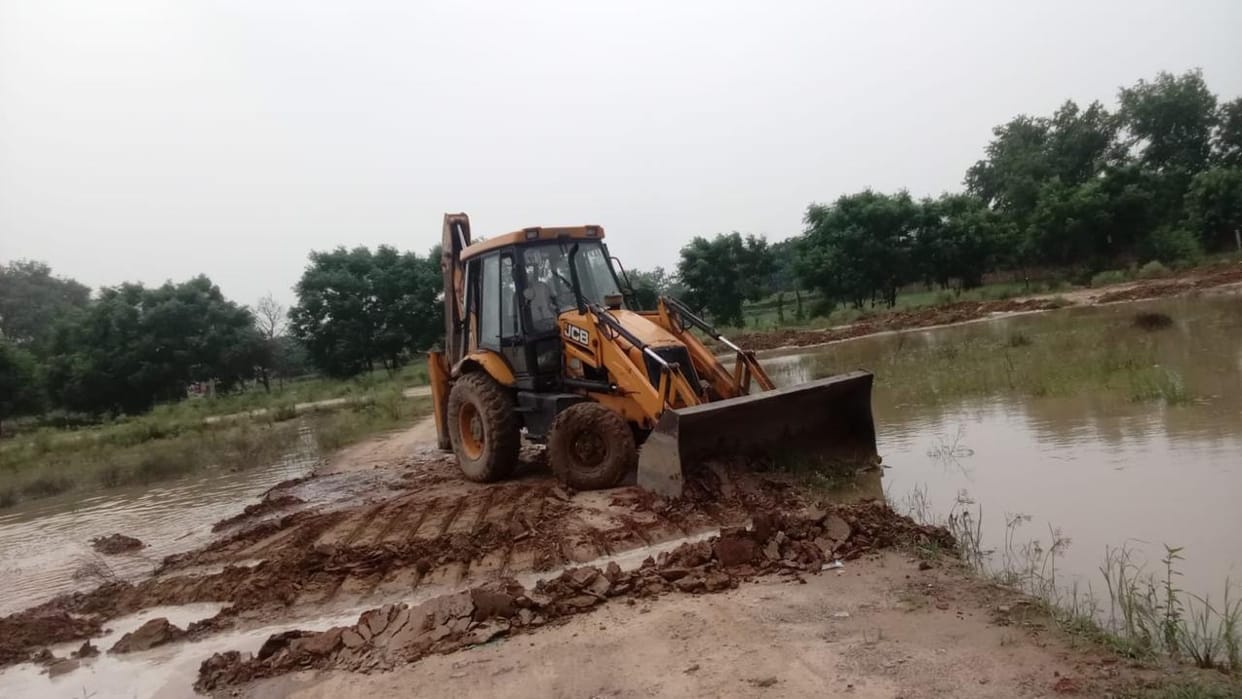 Bulldozer action in illegal colony; road network demolished.