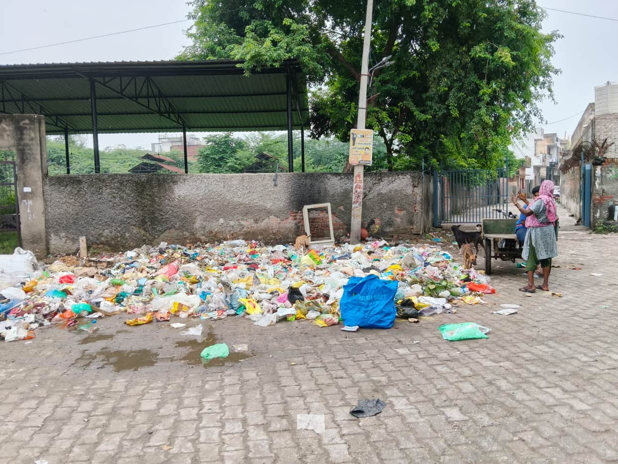 Sanitation and waste removal operations disrupted by the double whammy of a strike and rain.