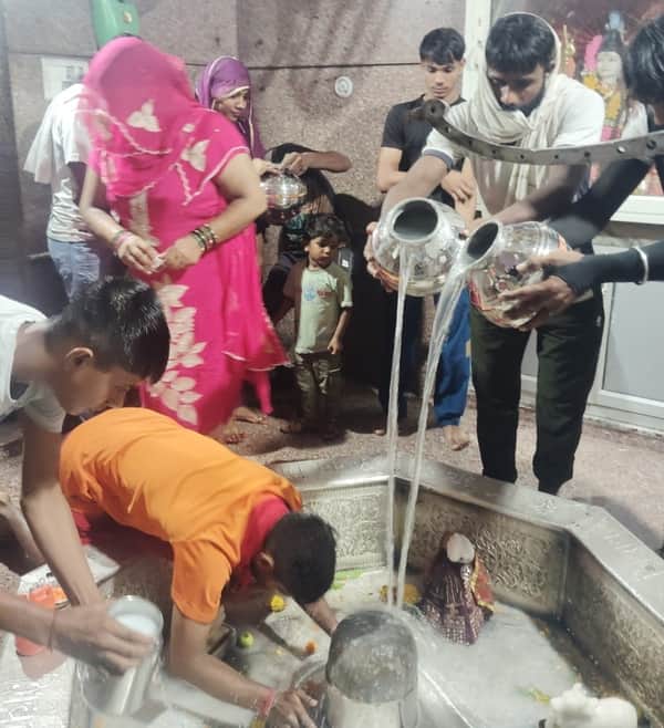 Devotees performed *Jalabhishek* at Shiva temples.