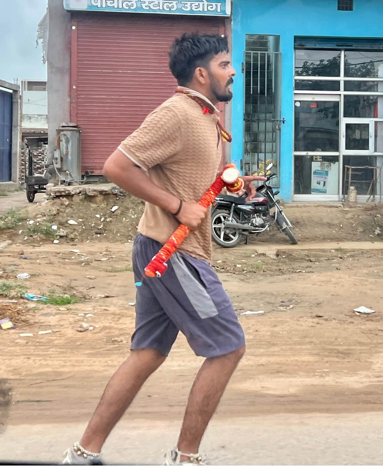 Carrying a basket as if it were a palanquin, he became immersed in devotion to Shiva.