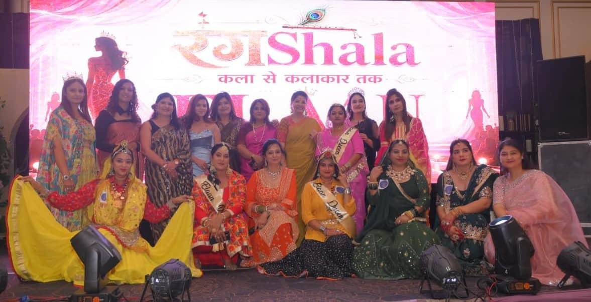 A platform for women's empowerment adorned in the colors of Teej.