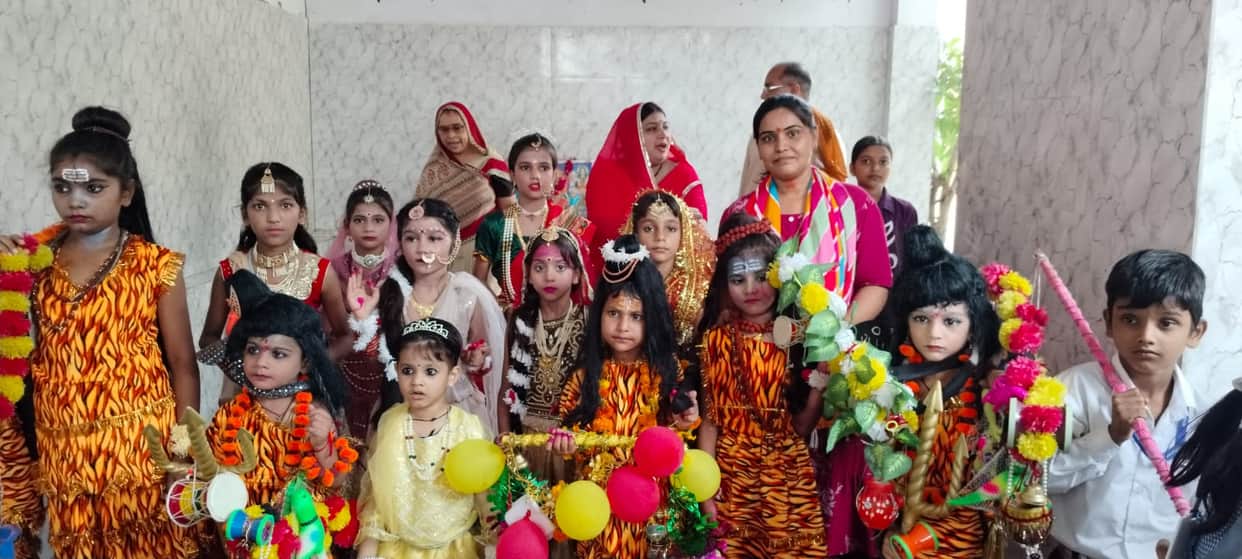 Children took out a Kanwar Yatra dressed as Shiva and Parvati.