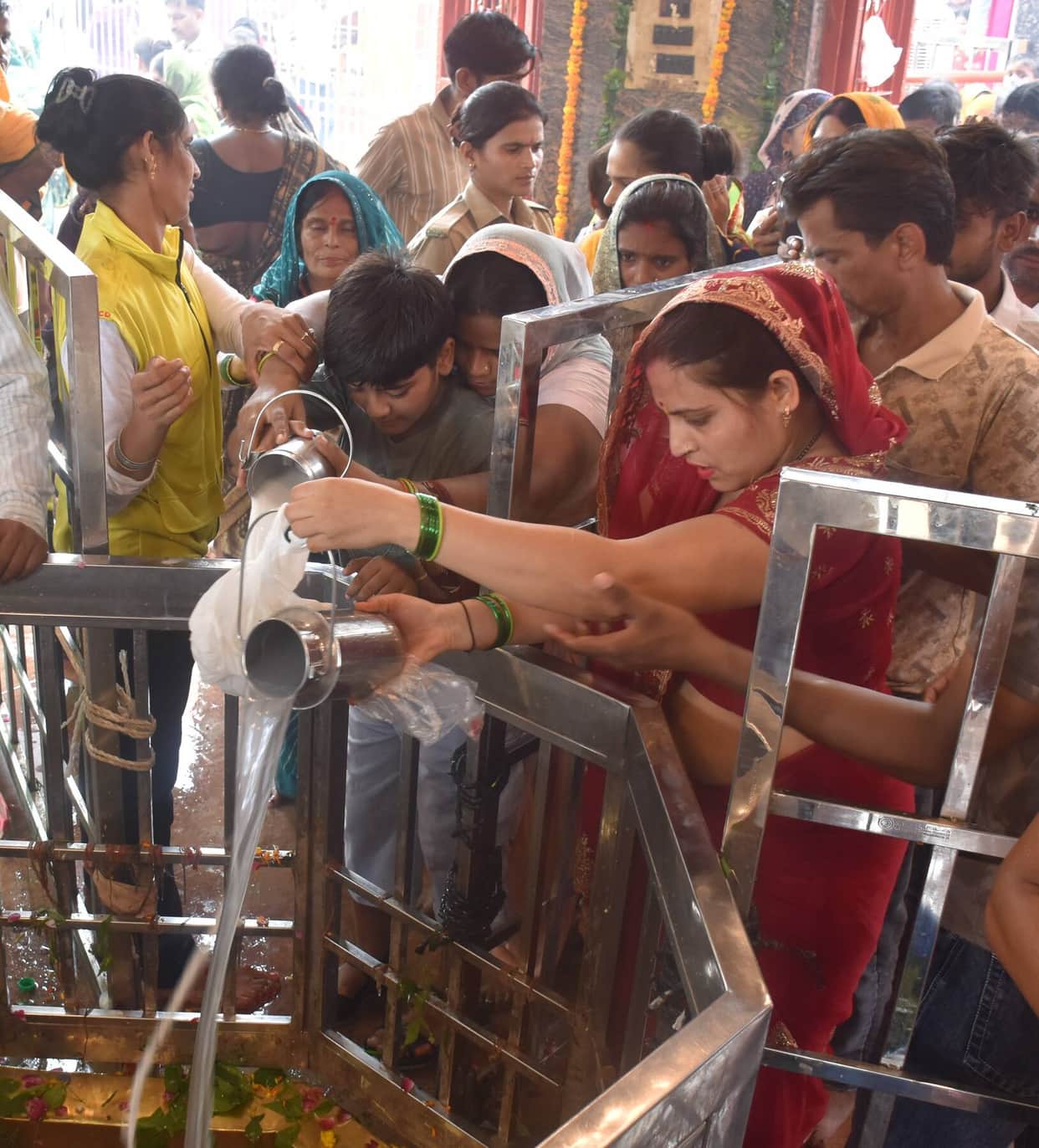 Kanwariyas arrived carrying Ganga water, and the chant of "Bam-Bam Bhole" echoed in Shiva temples throughout the day