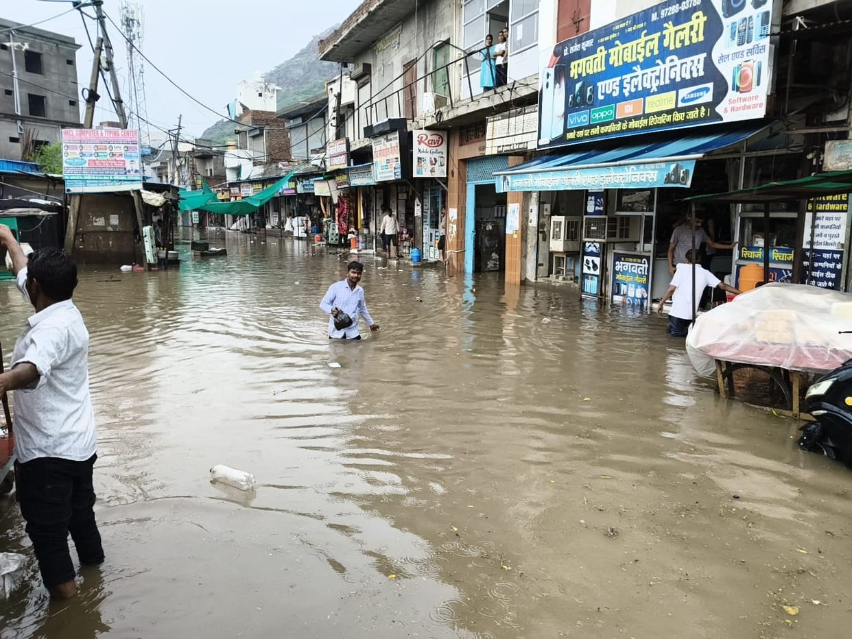 Tosham's main market turned into a lake following 10 mm of rainfall.