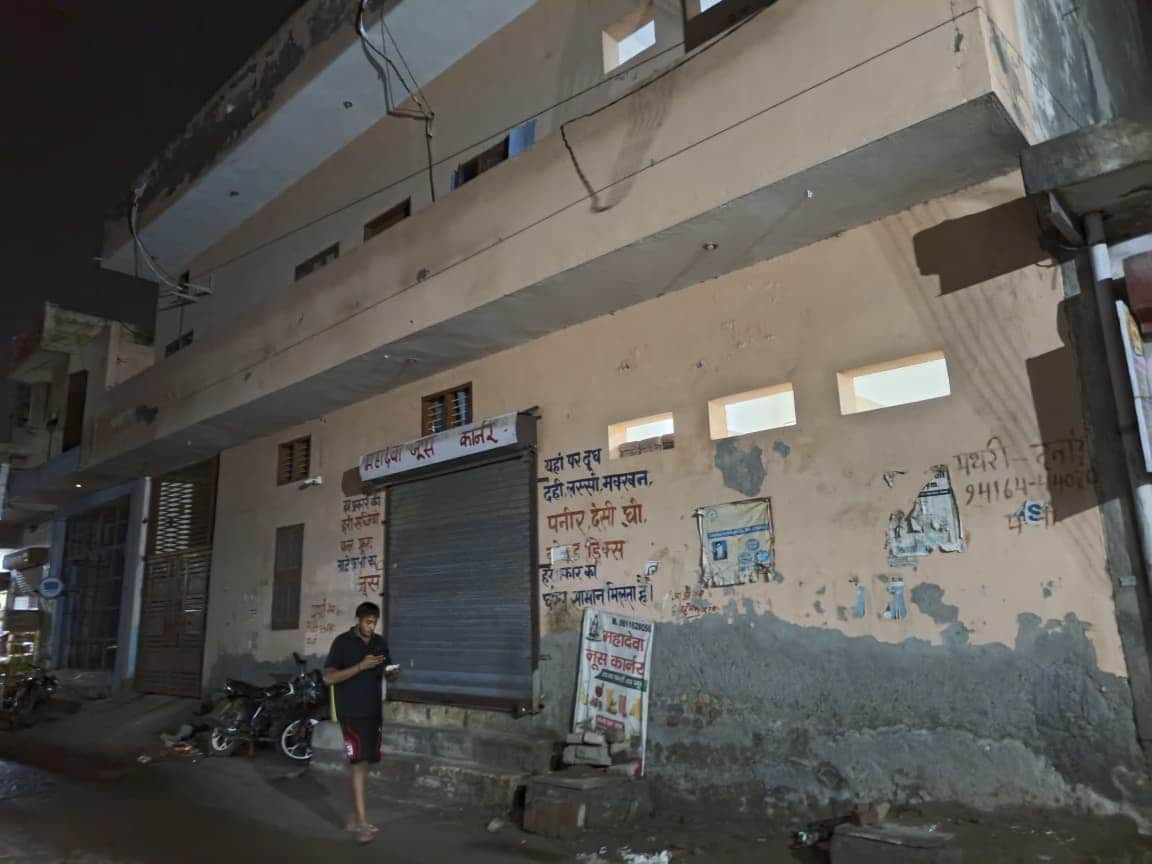 A juice corner board hangs at the Mahadev Wrestling Academy, which Brij Bhushan identified as the hub of the conspiracy.