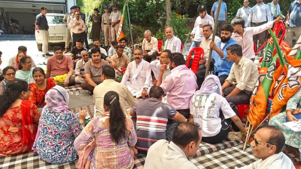 BJP and Congress workers face off over flags.