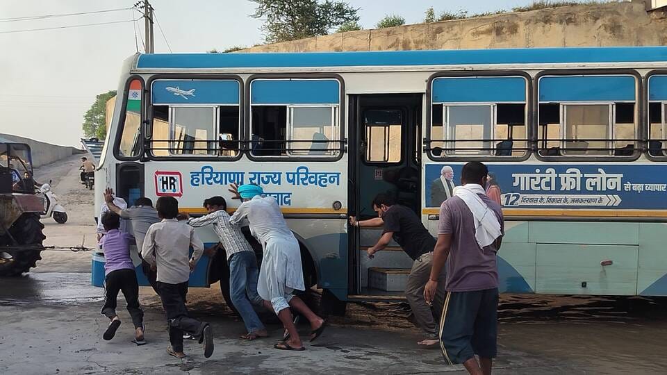 Roadways bus gets stuck in railway underpass; villagers rescue 50 passengers