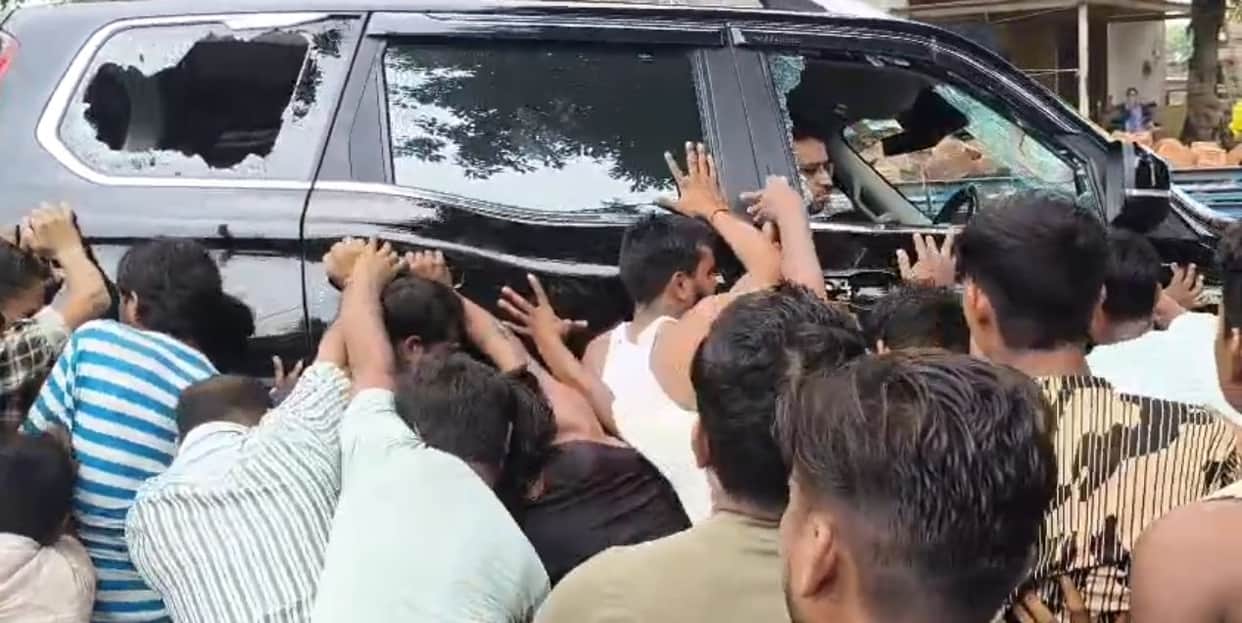 A mob beat up a doctor and stripped him half-naked in the presence of the police after cattle were injured.