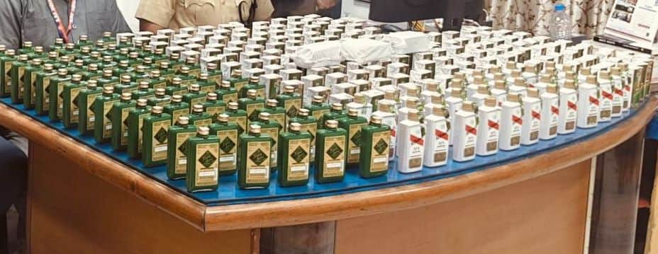 51.66 liters of illicit liquor found with a train attendant