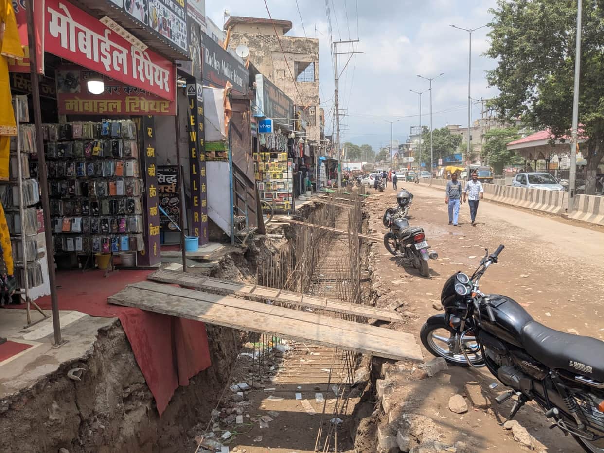 Drain dug up in front of shops on Baddi-Sai Road; shopkeepers distressed.