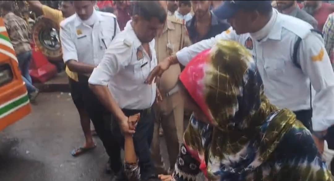 Mentally unstable young woman lying in front of a Roadways bus at the Jain Temple tri-junction.