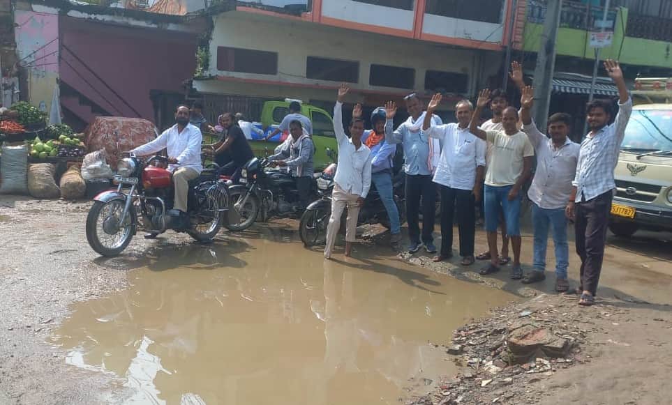 Traders protest over potholes on the road.