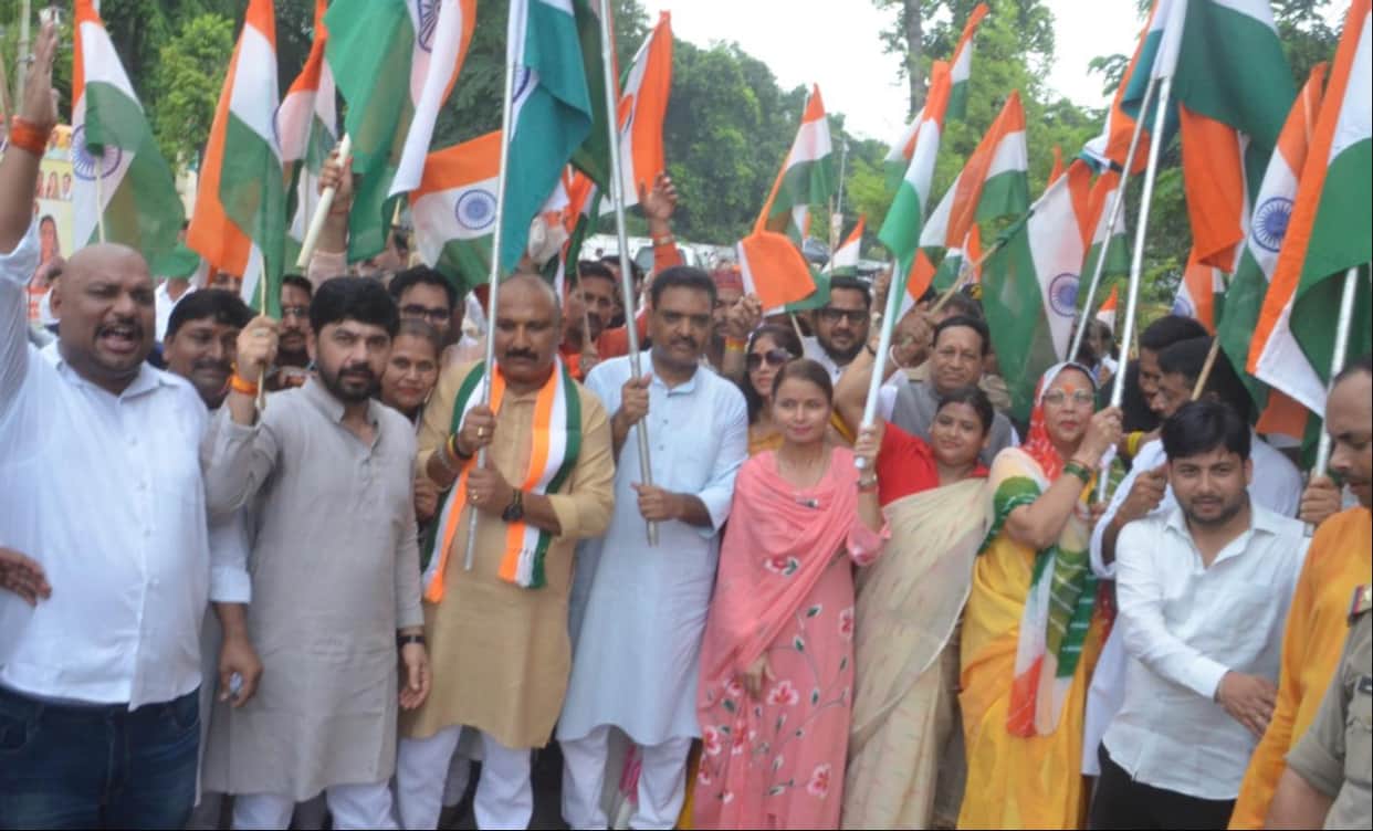 Marching forward with heads held high, proudly bearing the Tricolour.