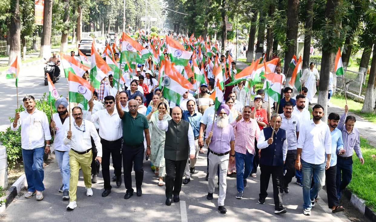 University students, immersed in the spirit of patriotism, holding the Tricolour.