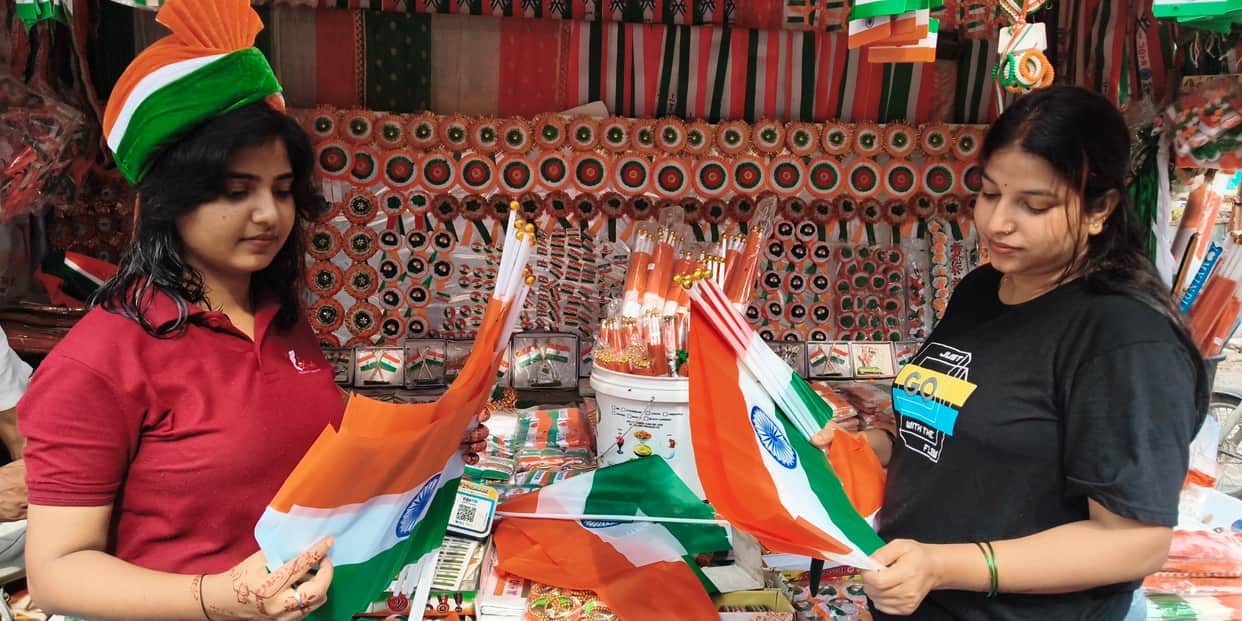 Markets decked up for Independence Day; brisk buying of Tricolours and badges.