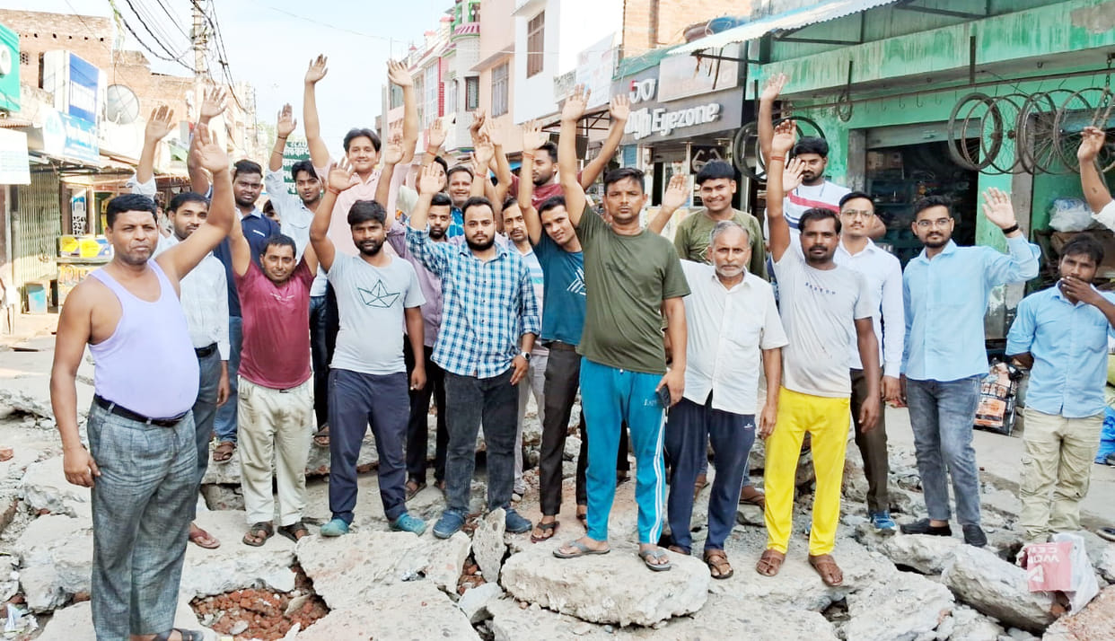 Shopkeepers staged a protest over the failure to clear road debris.