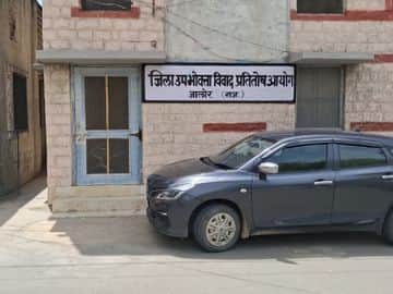 Jalore Consumer Court gets tough warrant issued against former Collector and current Labour Commissioner.