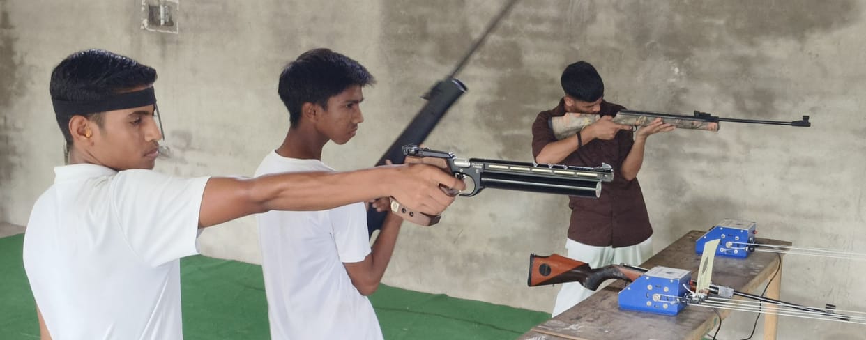 Took aim with a rifle and a pistol