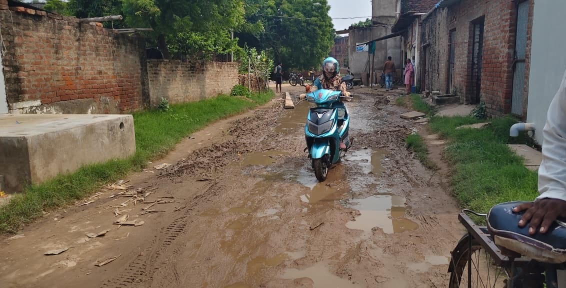 A two-kilometer stretch of road in Zahidpur Ward is covered in mud