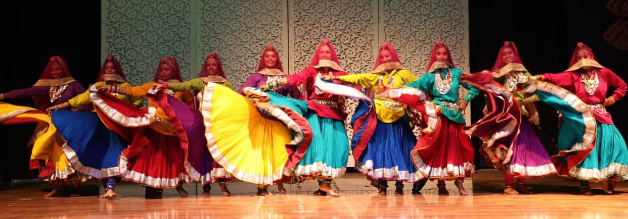 The Teej festival comes alive with the melodies of *Sawan* *Malhar* and folk songs; the audience is captivated.