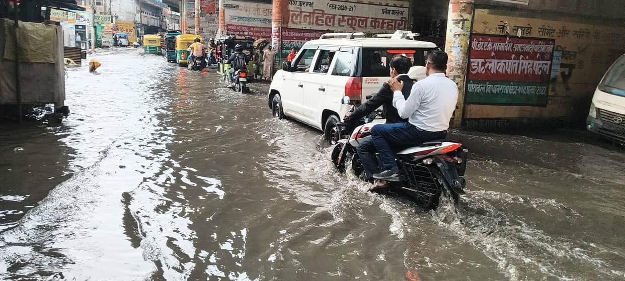 Heavy rain washed away the heat and submerged the roads.