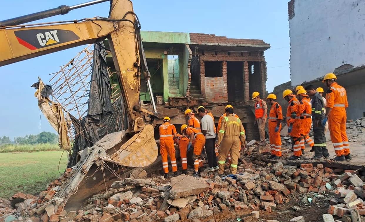 Two motorcycles and a bicycle were damaged in the debris, while household goods and grain were buried in the soil.