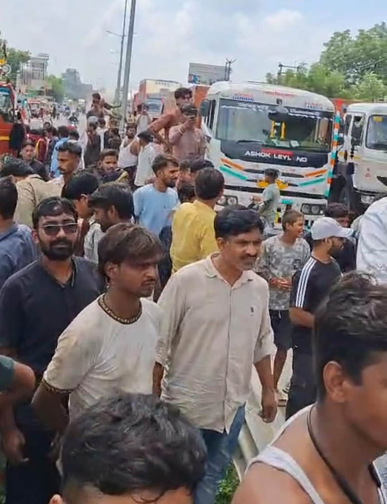 Uproar over vehicle checks; trucks parked on highway to block traffic