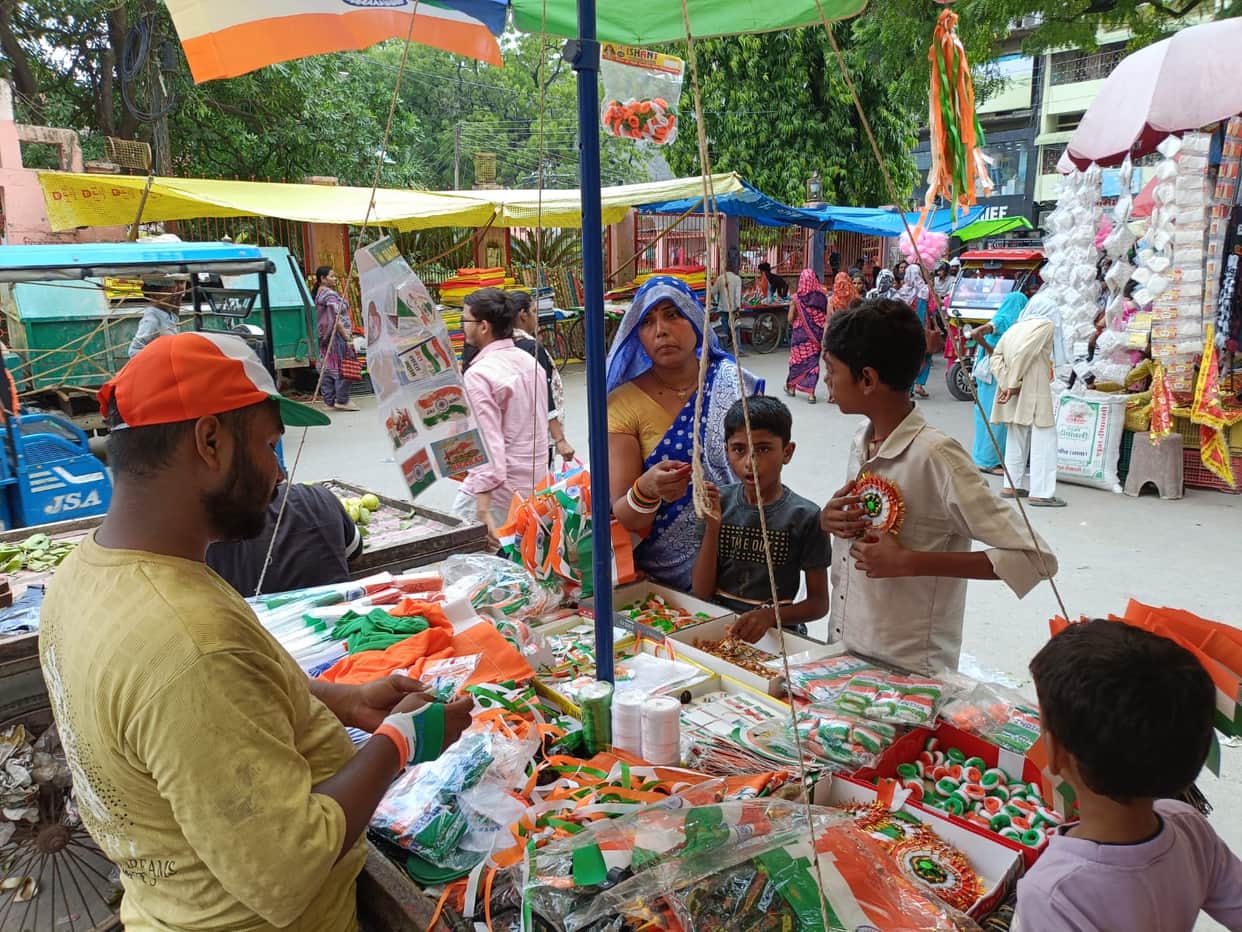 There was brisk buying of tricolour flags, ribbons, and caps.