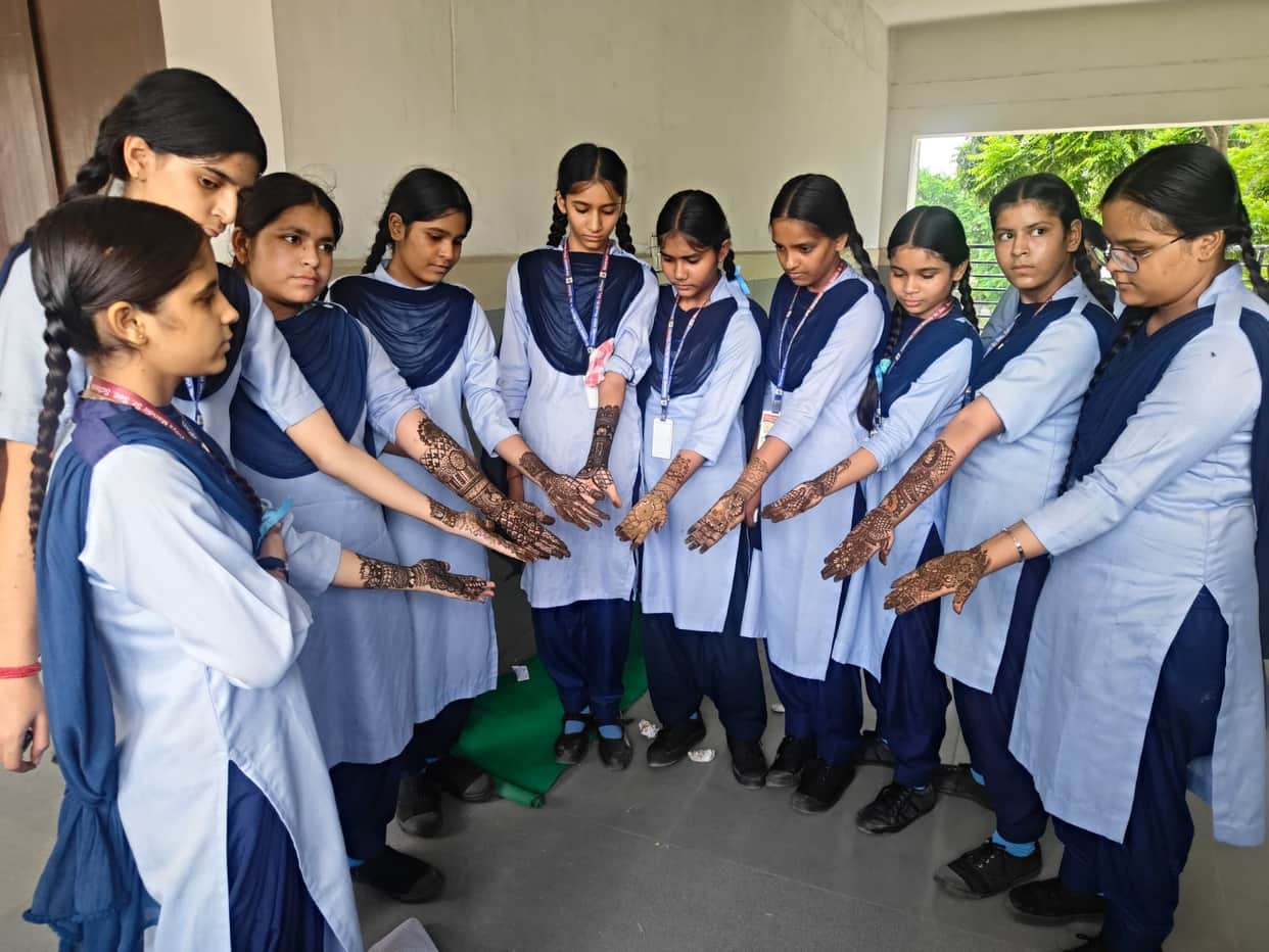 Female students showcased their talent in the Mehndi competition