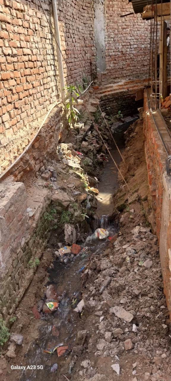 12 open drains across two municipal bodies; falling into any of them would make survival difficult.