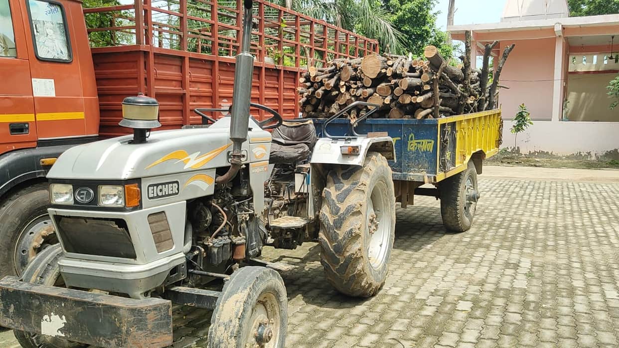 Raid conducted following a tip-off about the felling of a green tree; tractor-trolley seized.