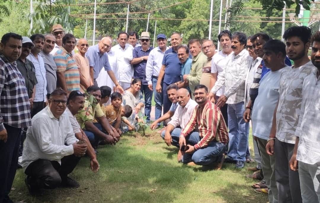 Took a pledge to protect the environment by planting saplings.