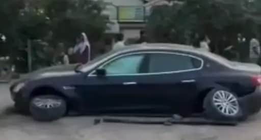 Multi-crore Maserati crashes into divider; wheels break off.