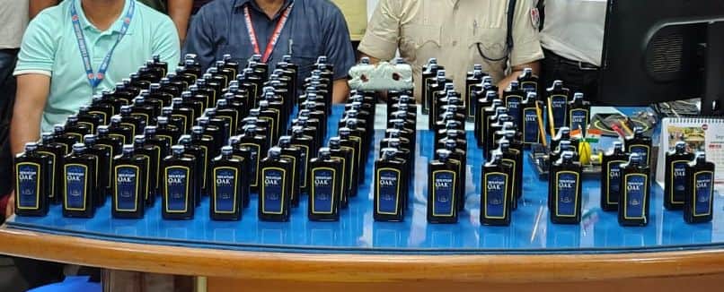 Train coach attendant arrested for liquor smuggling