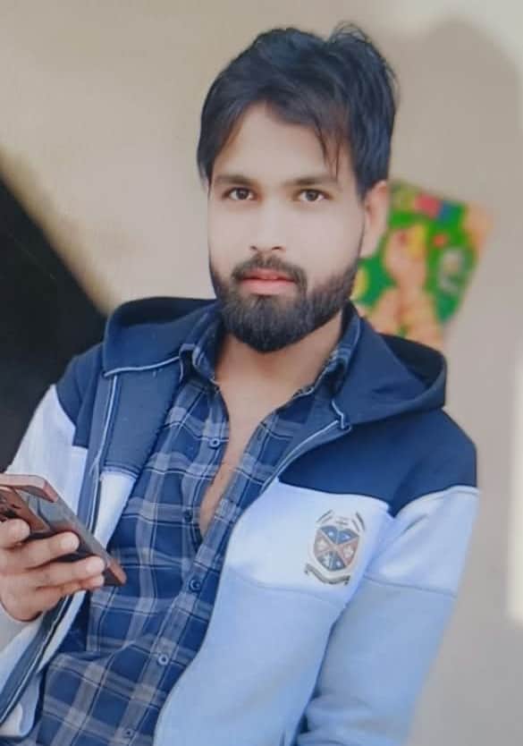 Body of a young man found in a car parked on the service road.