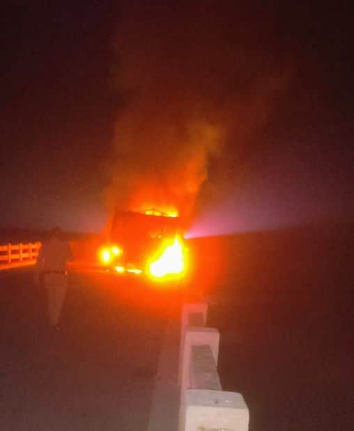 A truck loaded with refined tins caught fire, burning the cabin.