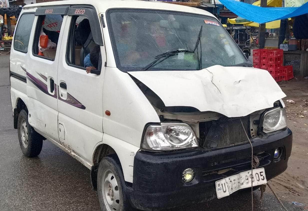 Car damaged after colliding with stray animals; Kanwariyas have a narrow escape.