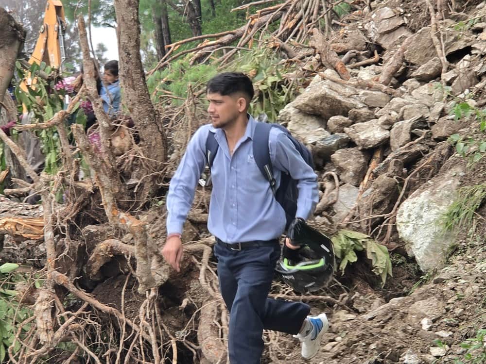 When the road collapsed, life teetered on the brink of the precipice.