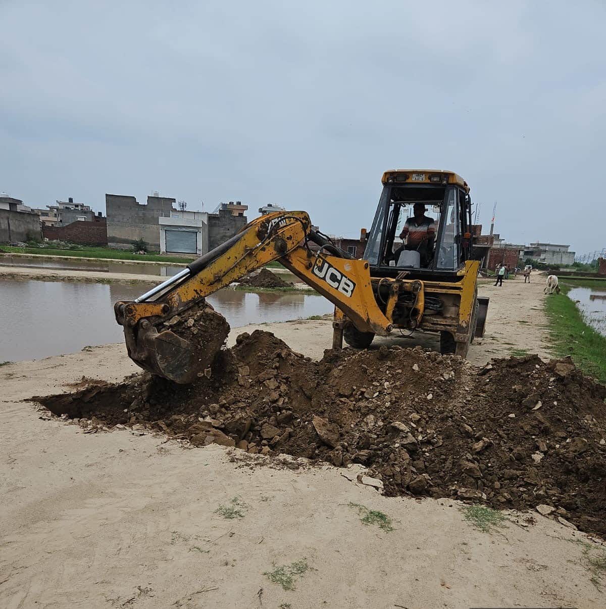 Bulldozer used on an illegal colony being developed on 2.5 acres of land.