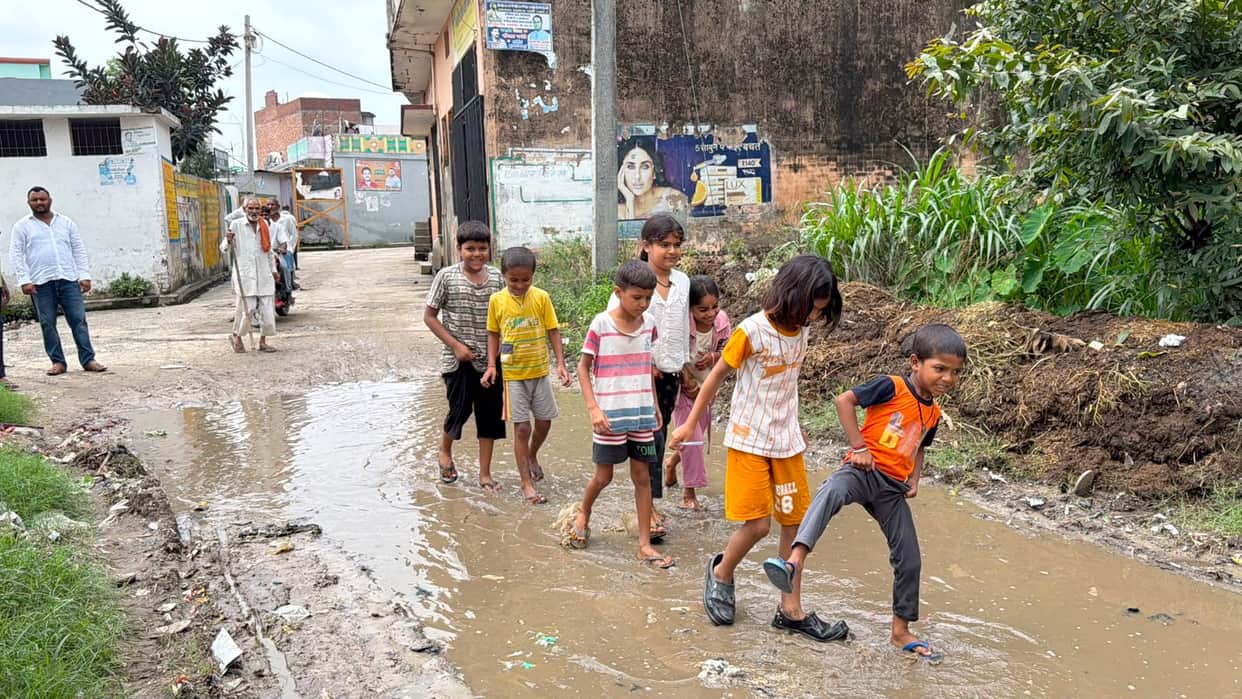 The road near the primary school in Parvatpur village is in bad condition.
