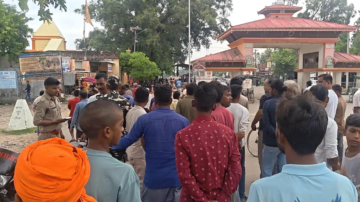 Policeman dragged across the border into Nepal; scuffle ensues.