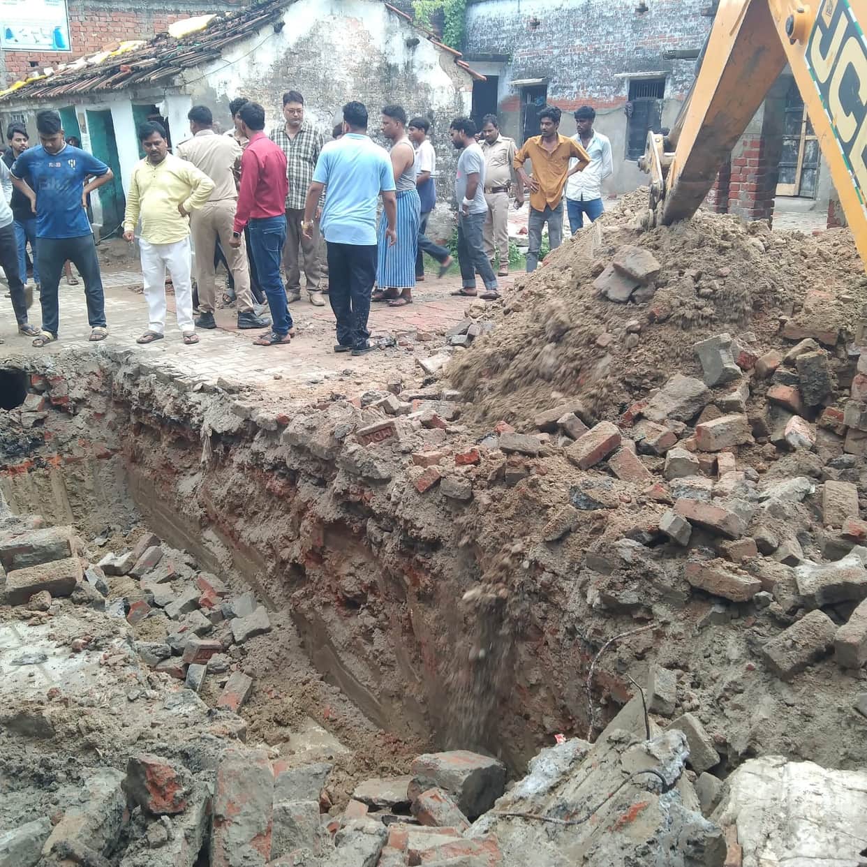 SDM halted the drain excavation amidst protests.